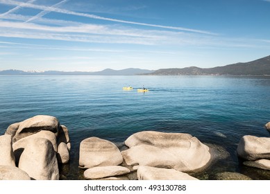 People Kayaking On Lake Tahoe