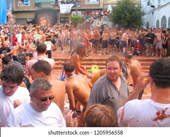 People In La Tomatina Of Bunyol, Valencia, Spain. August 2017