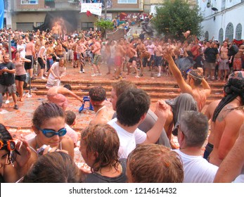 People In La Tomatina Of Bunyol, Valencia, Spain. August 2017