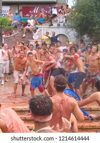 People In La Tomatina Of Bunyol, Valencia, Spain. August 2017