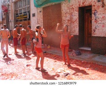 People In La Tomatina Of Bunyol, Valencia, Spain. August 2017