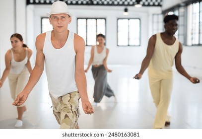 People learning swing steps at dance class