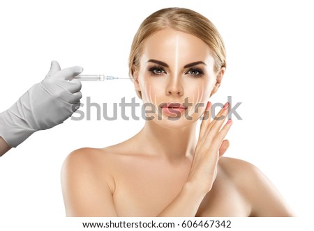 People, Lips, Face cosmetology, plastic surgery and beauty concept - beautiful young woman face and hand in glove with syringe making injection