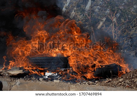 People living in poor communities in South Africa dispose of trash that has been illegally dumped by setting it alight,  because local service delivery is unreliable, this causes massive pollution.