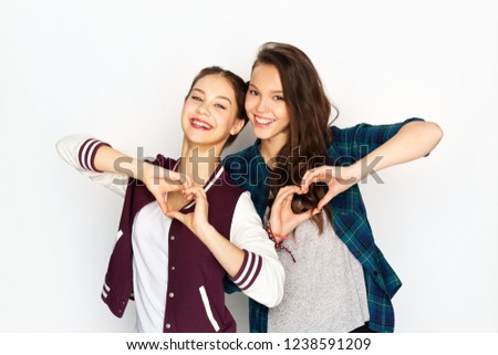 Similar – Image, Stock Photo smiling girls best friends lying on beach while looking camera