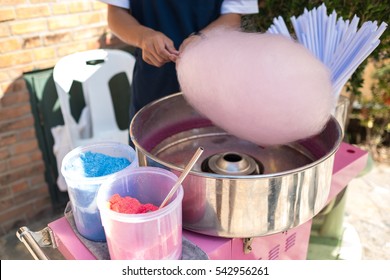 People make cotton candy for children