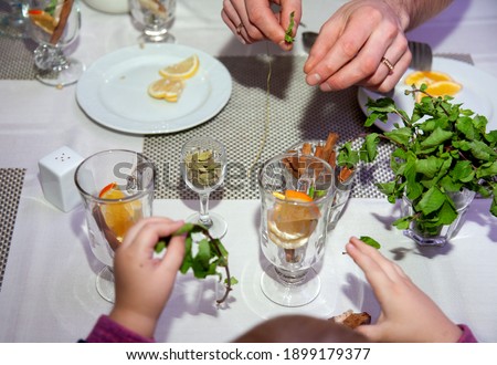 people make fruit tea on the table
