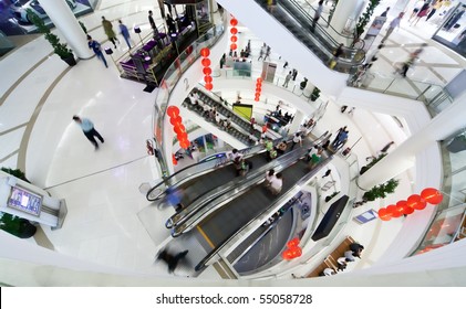 People Make Shopping In Big Modern Mall. Crowd In Motion Blur