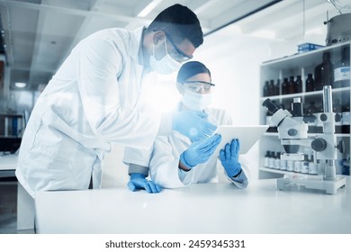 People, mask or scientists on tablet in lab for medical innovation, life expectancy or antiaging medicine. Teamwork, stem cell or biologists with chemistry research, results or science information - Powered by Shutterstock