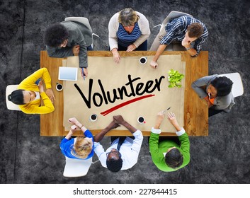 People in a Meeting and Single Word Volunteer