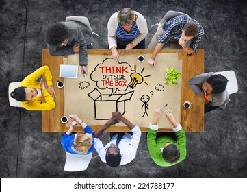 People in a Meeting and Thinking Outside the Box Sayings - Shutterstock ID 224788177