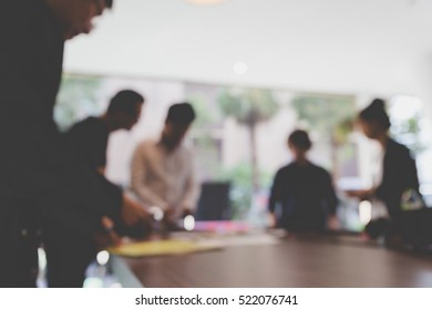 People Meeting And Working In Office Workplace - Blur Background