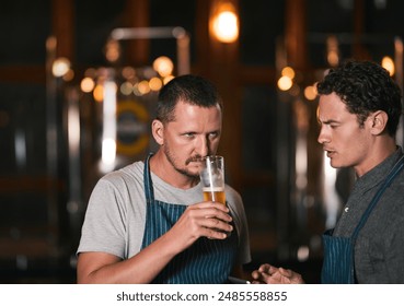 People, men and beer tasting in brewery for manufacturing, ingredients and production with collaboration. Entrepreneur, team and alcohol for distillery process with inspection, drink and craft lager - Powered by Shutterstock