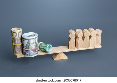 People and money on the scales. Concept of wages for employees and workers. Financial support and charity funding. Taxpayers pay taxes. Generation of profits and revenues. Subsidies, social benefits. - Shutterstock ID 2036598047