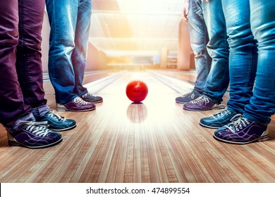 People near bowling ball