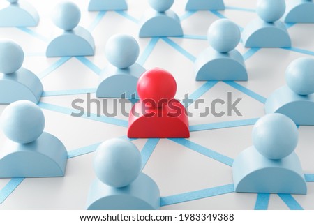 People networking and influential person.ã€€Person shape blocks and network structure.
