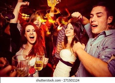 People in night club. Dancing, drinking and having fun - Shutterstock ID 271501124