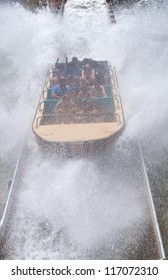 People On A Boat During  A Splash Ride In An Amusement Park In Port Aventura, Spain