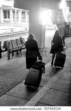 Similar – waiting for the train