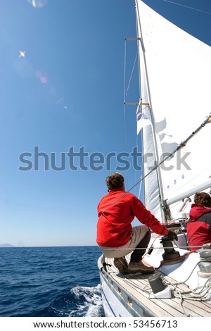People on sailing boat on the sea
