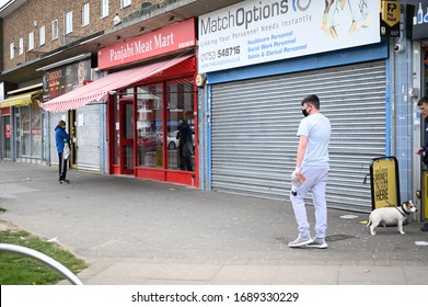 People On The Street Wearing Face Masks Slough England 31.03.2020