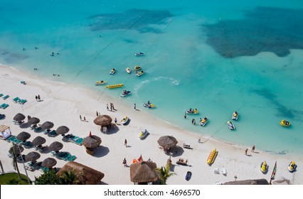 People On Vacation On The Beach At A Resort Hotel In Cancun Mexico