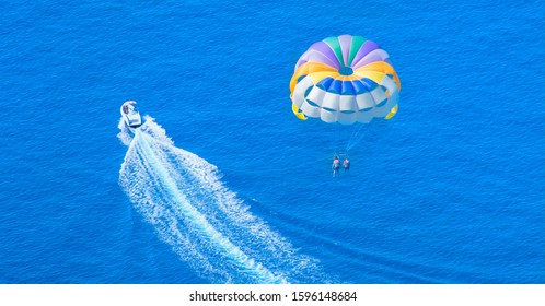  People parasailing with colorful parachute - Alanya, Antalya