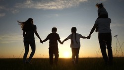 People In Park Silhouette. Happy Family Kid Dream Holiday Concept. Friendly Family Lifestyle Holding Hands Walking Dog At Sunset In The Park Silhouette. Big Family Silhouette Walk In The Park