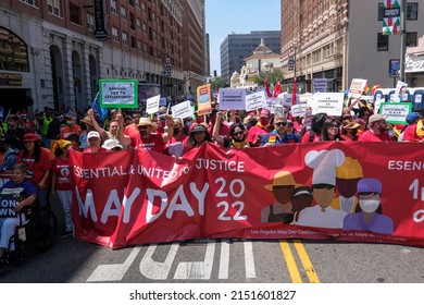 People Participate In The Annual May Day March In Downtown Los Angeles, Sunday, May 1, 2022. 