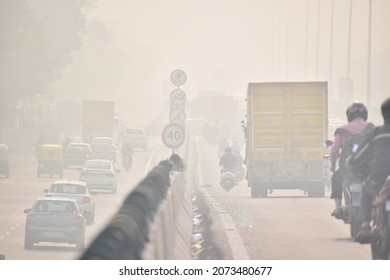 People Pass Through The Rising Pollution On The Delhi-Jaipur Expressway. Gurgaon, Haryana, India. November 12, 2021.