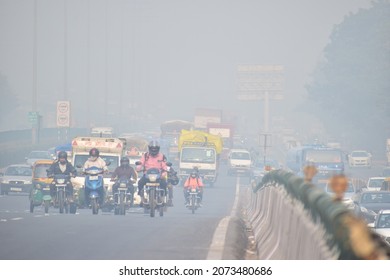 People Pass Through The Rising Pollution On The Delhi-Jaipur Expressway. Gurgaon, Haryana, India. November 12, 2021.