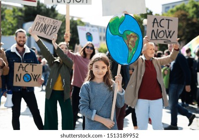 People with placards and posters on global strike for climate change. - Shutterstock ID 1513189952