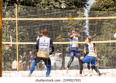 People Play Beach Volleyball In Moscow. Outdoor Games In Nature. Gorky Park, Moscow, Russia, September 2022