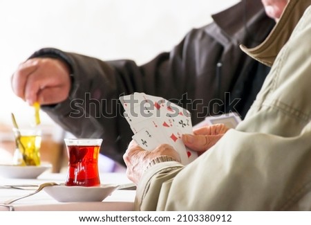 
People playing cards, drinking tea Stok fotoğraf © 