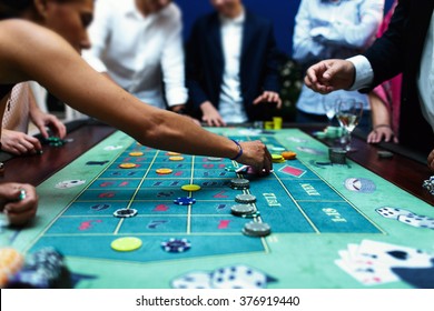 People Playing Poker In The Casino, Roulette, Gambling