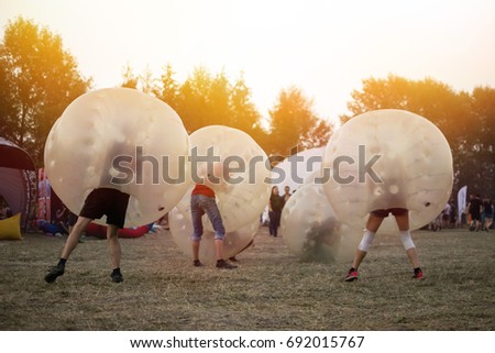 people playing soccer bubble