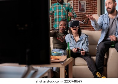 People Playing Video Games With Vr Glasses At Fun Gathering, Enjoying Competition Play With 3d Headset Simulation And Virtual Reality. Friends Cheering To Win Game On Tv Console.