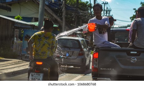 People are playing water splash on Songkran Festival in Koh Samui, Thailand on April 13, 2018.