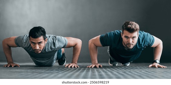 People, portrait and push up in gym for workout, strong muscle development and support together. Men, friends and confident in exercise routine at health center, personal trainer and coaching client - Powered by Shutterstock