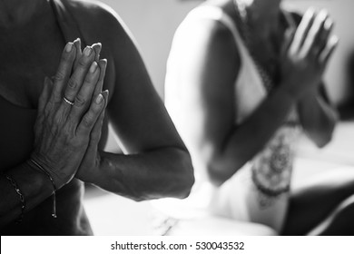 People Practicing Yoga And Meditation In Retreat Studio Class During Bali Vacation Recreation, Praying Hands