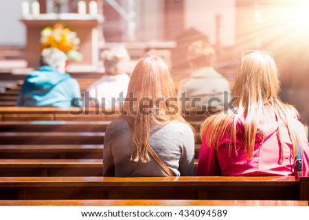 People praying in a church