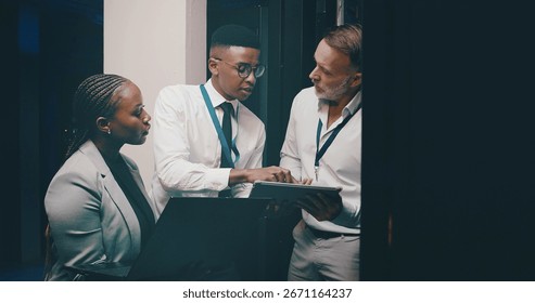 People, programming or tablet in server room, conversation or teamwork with engineering. IT specialist, technical support or employees with discussion, problem solving or feedback with cyber security
