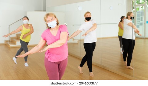 People In Protective Masks Learning Swing Steps At Dance Class