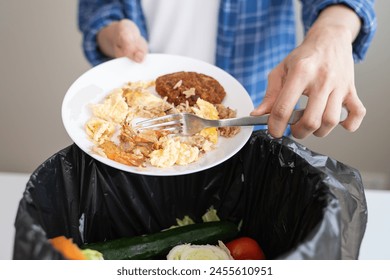 people put bio trash from food waste in domestic homes to compost bins to make fertilizer to reduce global environmental pollution. - Powered by Shutterstock