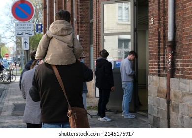 People Queue To Vote For The First Round Of The Presidential Election At A Polling Station  In Lille,  France, On April 10, 2022.