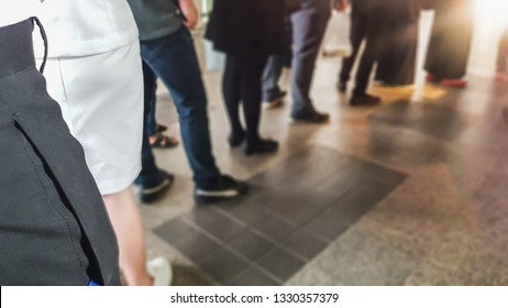 People In Queue Waiting For Buying Coffee In Morning.  Man And Woman Orderly In Line With Defocus