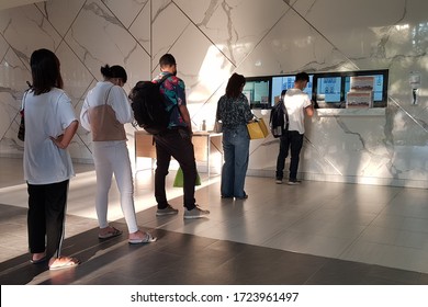 People In Queue Waiting For Something,social Distancing,Epidemic Control, Covid 19, Coronavirus, Bangkok Thailand,  Wearing A Protective Mask, Distance For One From Other People, New Normal, Line Up,