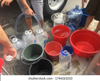 People Queued Up To Collect Water From Water Supply Tanker Due To Water Shortage In Kuala Lumpur. Water Crisis Is Due To Poor Management By Local Authorities