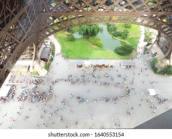 People queueing to go up the Eiffel Tower in Paris