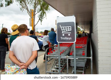 People Queuing At The Grocery